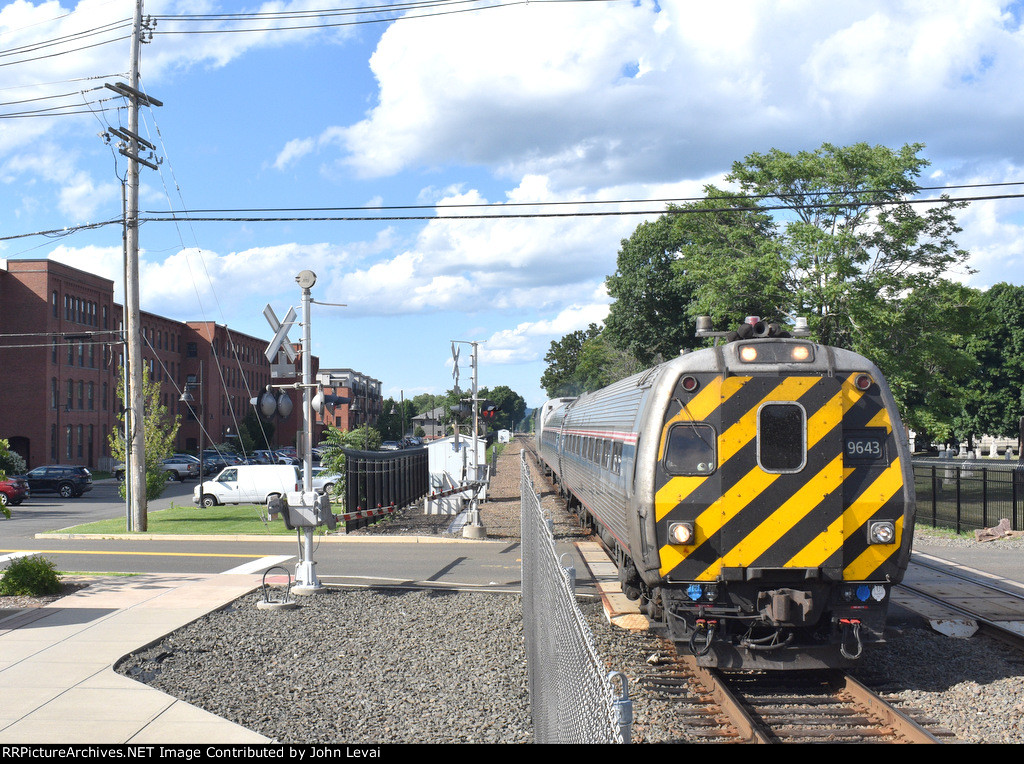 Amtrak Train # 475 arriving into Wallingford Station with Ex-Metroliner Cab Car # 9643 doing the honors